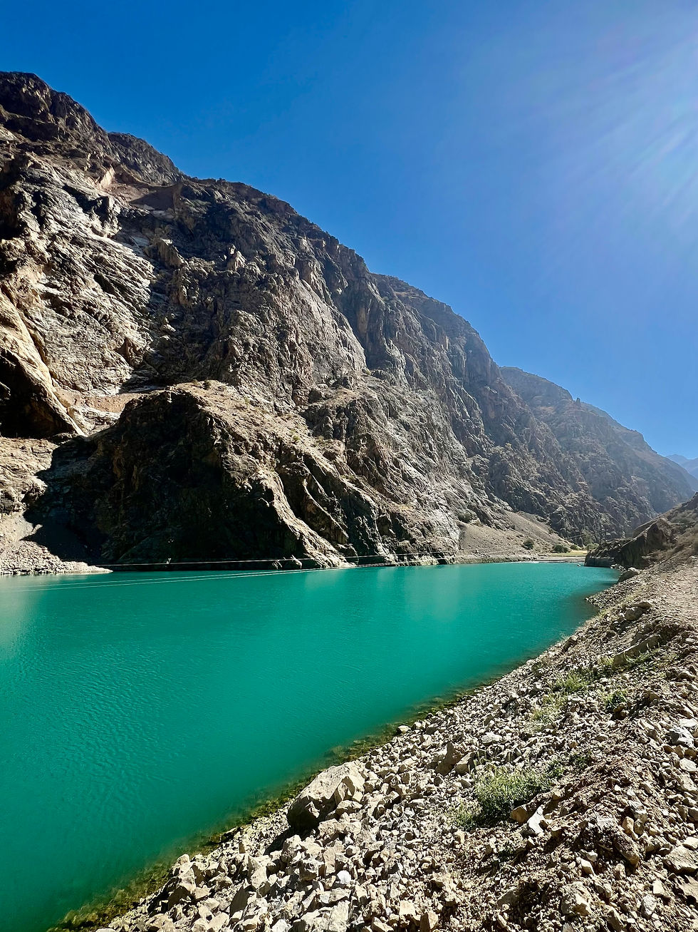 A bright turquoise lake, one of the seven lakes in Tajikistan