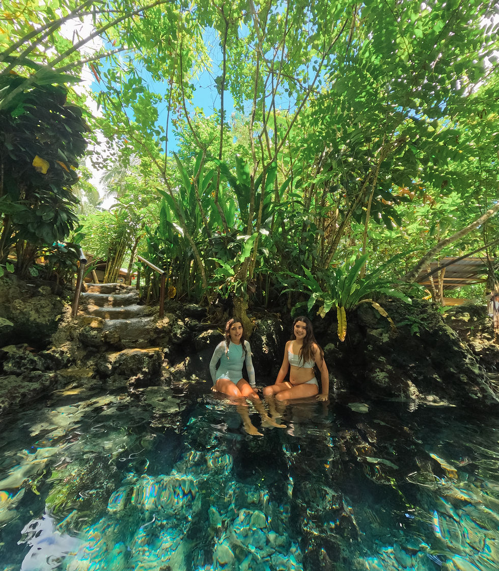 Kids-in-blue-water-rockpool-in-the-jungle
