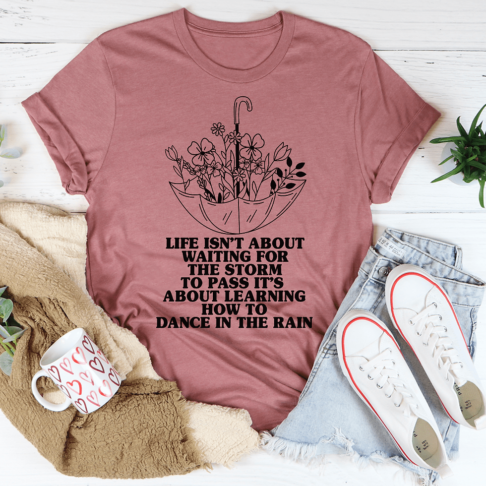 Mauve t-shirt with umbrella graphic and dance in the rain quote