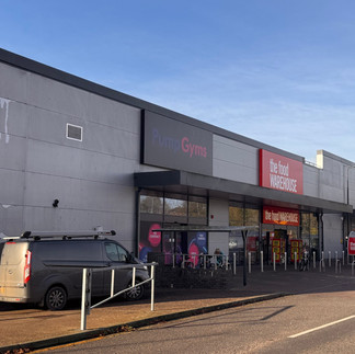 Commercial car park lighting at night showing full illumination and safe visibility