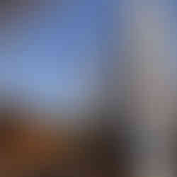 Electrical engineer inspecting car park lighting system to ensure safety and compliance