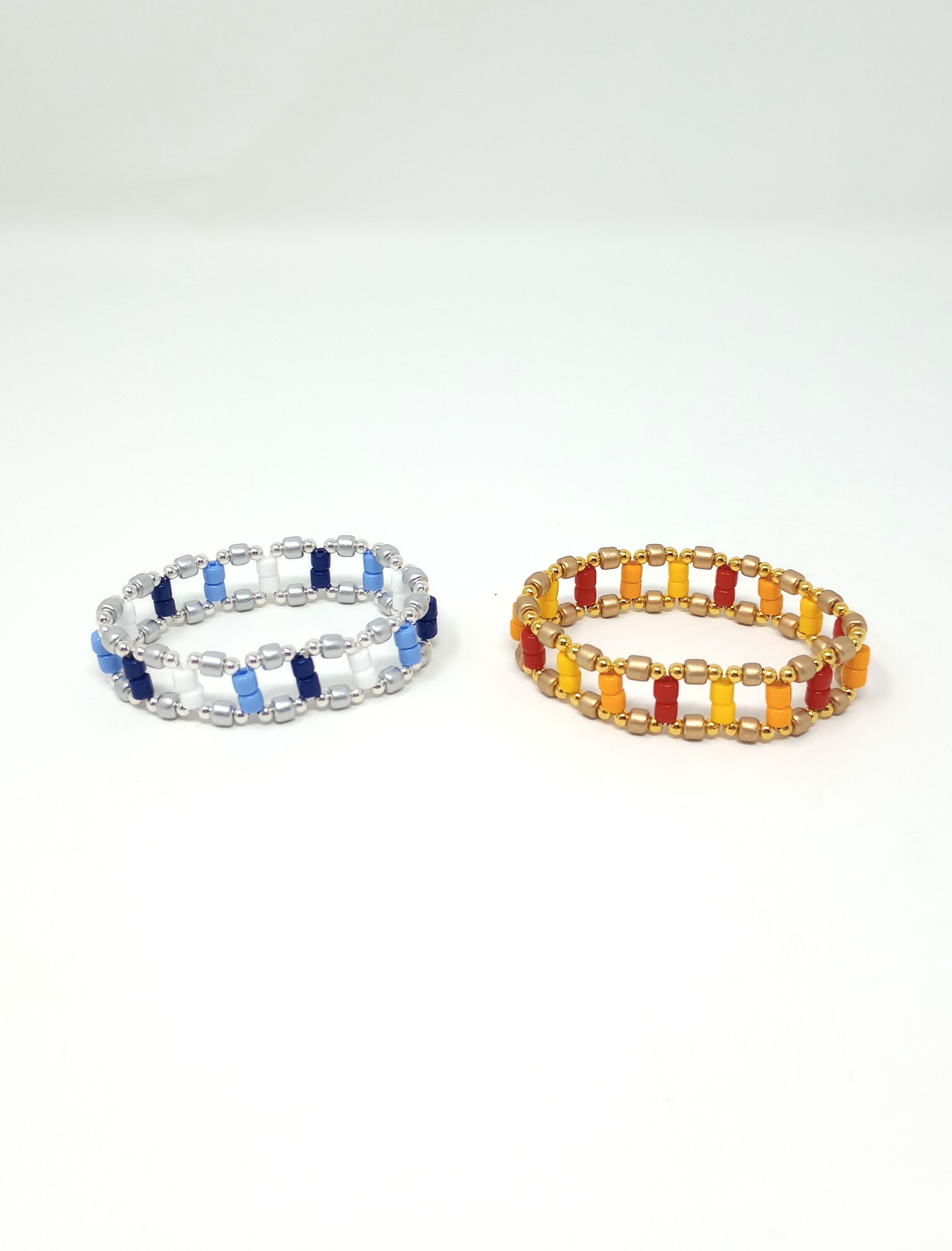Handbeaded stretch ladder bracelet in warm or cool tones.