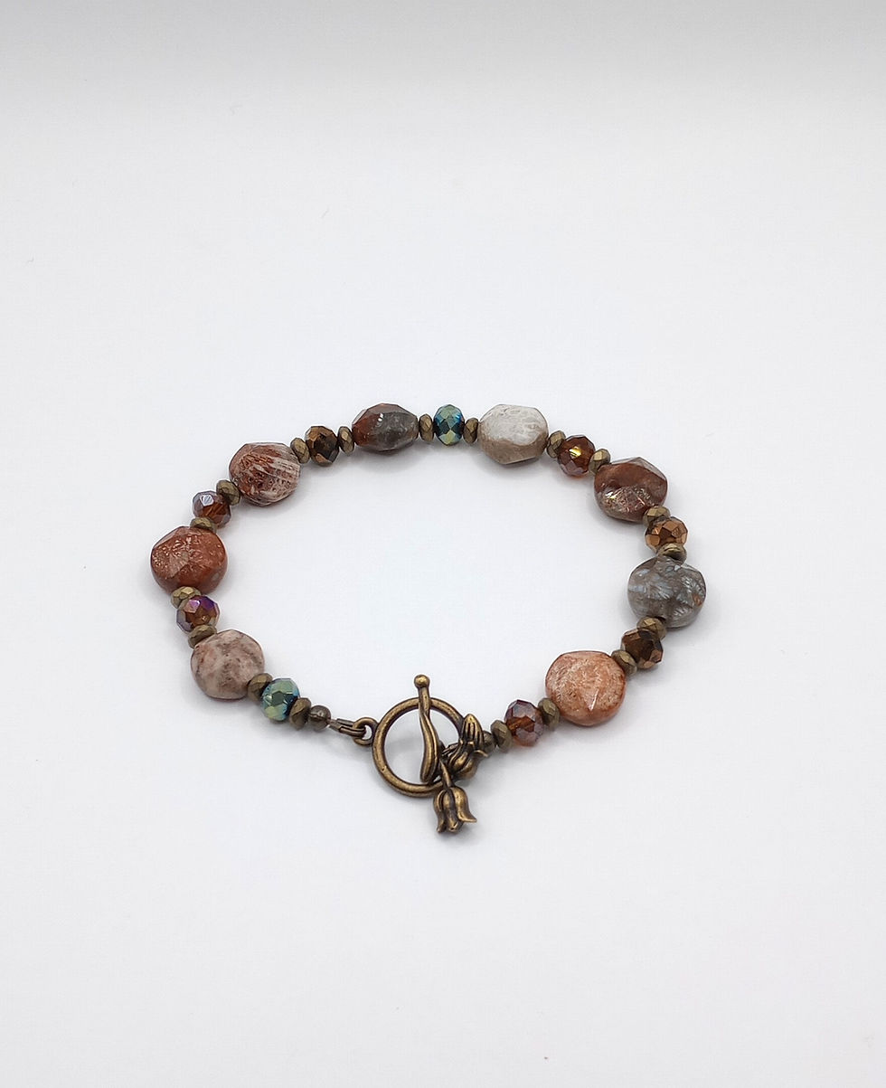 Thumbnail: Handcrafted fossil coral bracelet with hematite beads and crystals