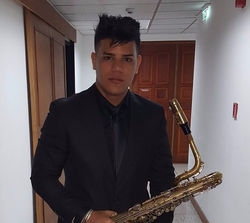 Victor Guzman, alto and baritone sax
