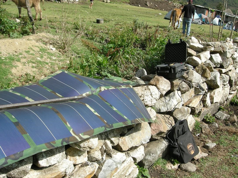 solar panel on rock wall