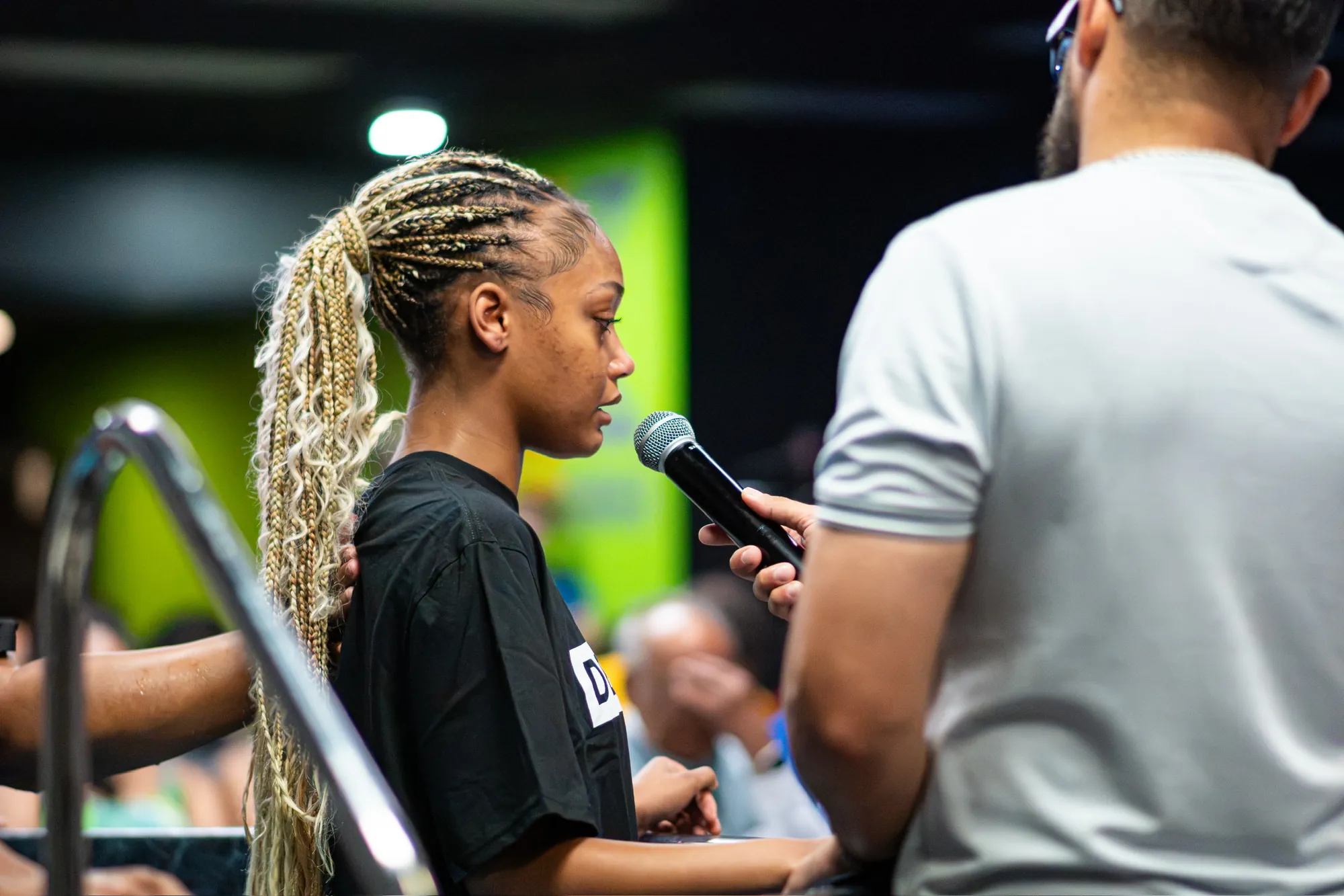 A woman sharing before or after her baptism