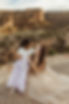 Mother and Daughter looking into each others eyes at Colorado National Monument in Grand J