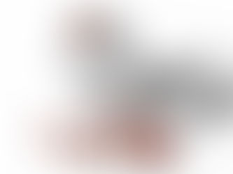 White bottle with open lid and red-yellow capsules scattered on a white surface. Pills fill the bottle, conveying a medication management