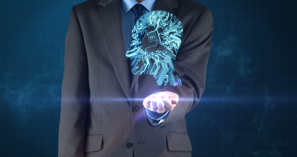 Suited person holds a glowing blue AI circuit hologram above an outstretched hand on a dark blue background. Illustrating the use of Chatgpt prompts