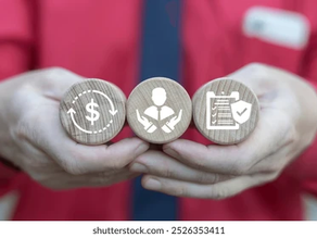 Hands in a red shirt hold three wooden coins with dollar, business, and checklist shield icons; Illustrating EAP MEANING