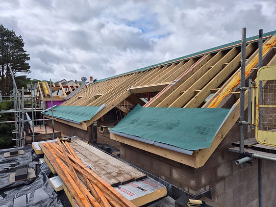 Close-up of wooden batten details on a roof structure under repair