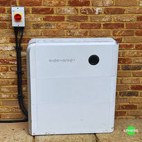 battery storage attached to brick wall