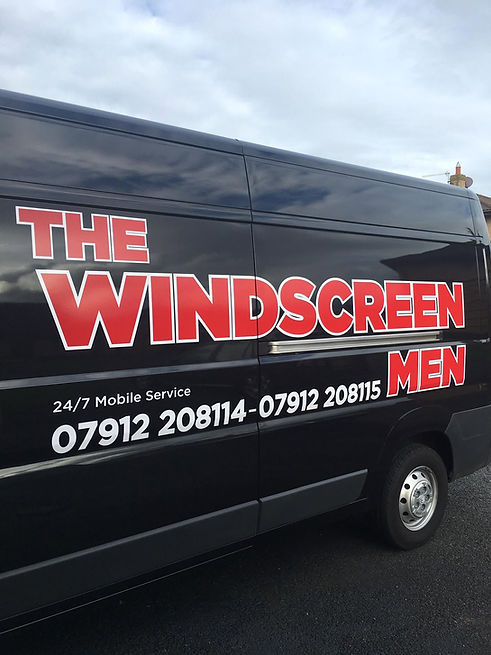 black windscreen man van