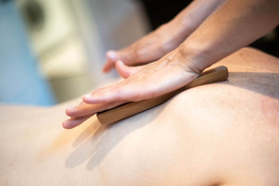 Massage aux bambous chauds