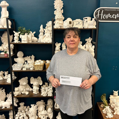 Barbour County Entrepreneur being presented a funding check