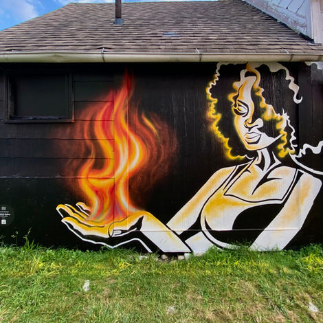 Painting of a woman holding fire in her hand