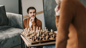 Man Admiring Himself in the Mirror
