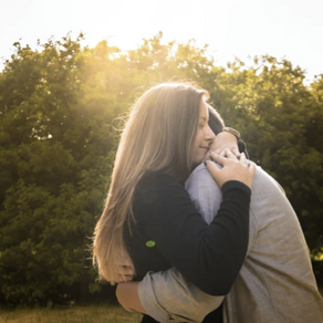 Married couple hugging