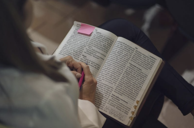 Woman reading the Bible