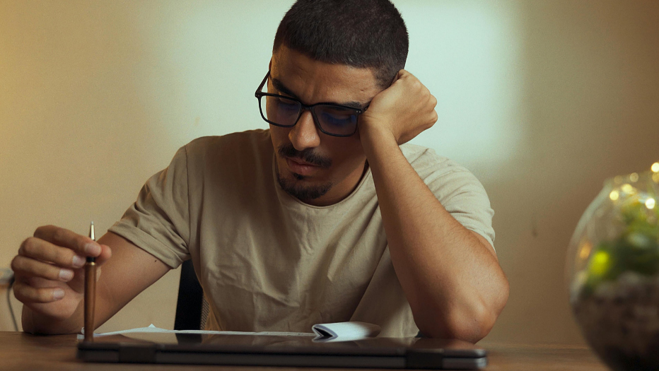 Man Struggling with Intrusive Thoughts