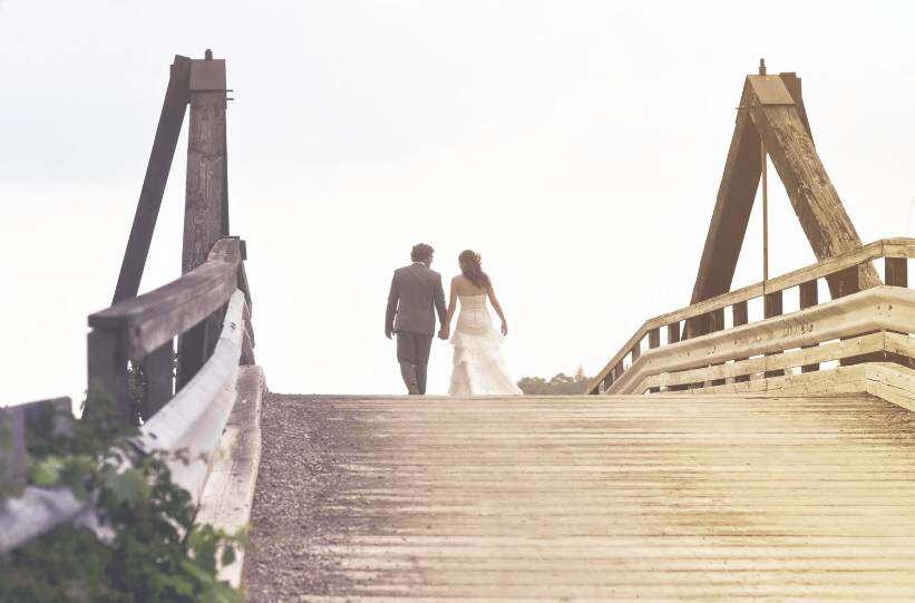 Newly-wed Couple Walking Together