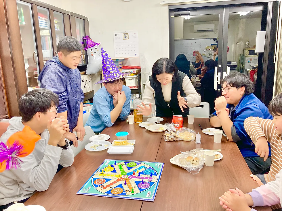 A lively game night unfolds as friends gather around the table, rolling dice and eagerly anticipating their next moves, despite the unpredictability of the outcomes.