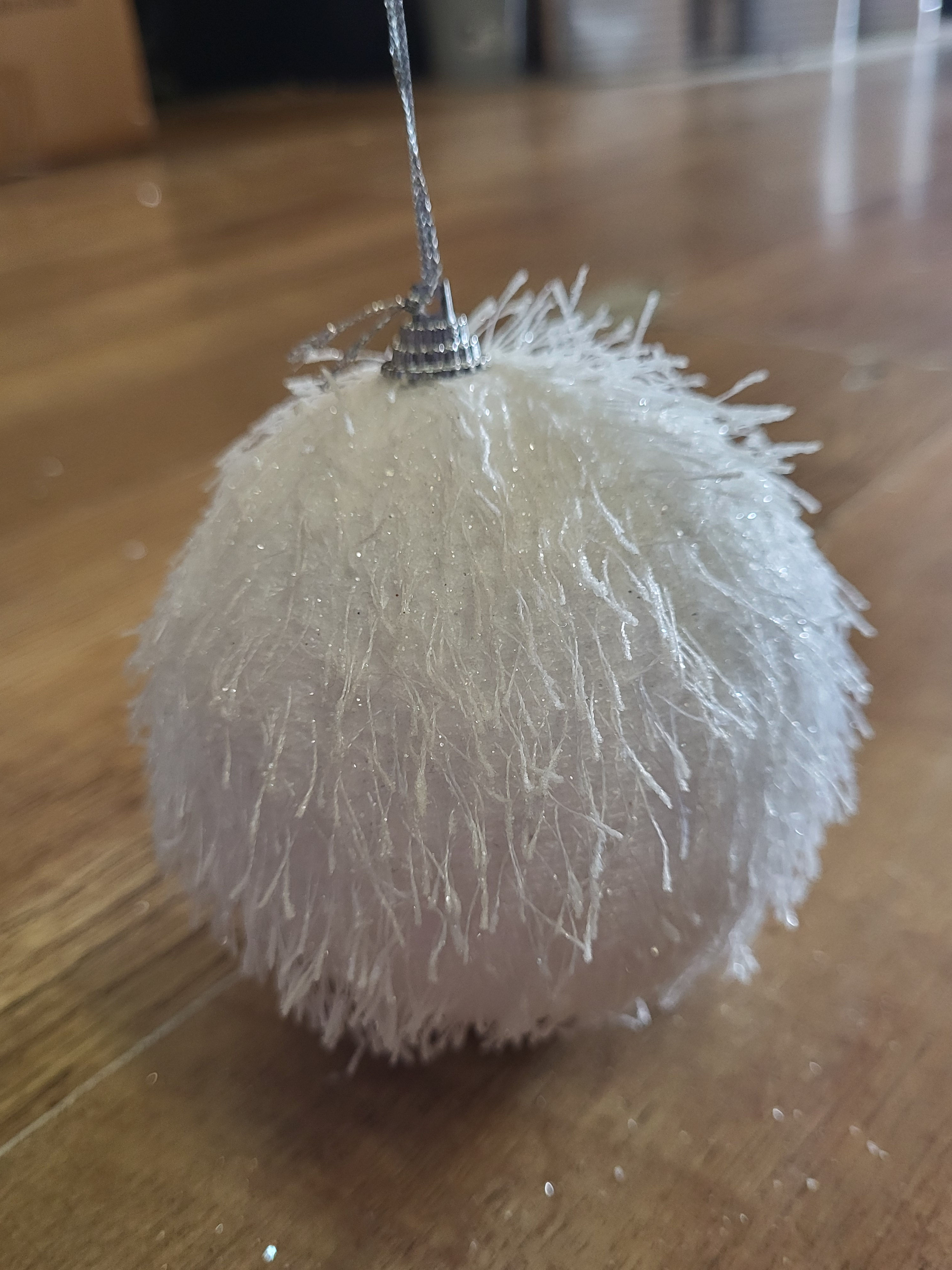 10cm white stringy bauble with sparkle