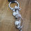 Thumbnail: Hanging circle with bells and ribbon - silver and white 