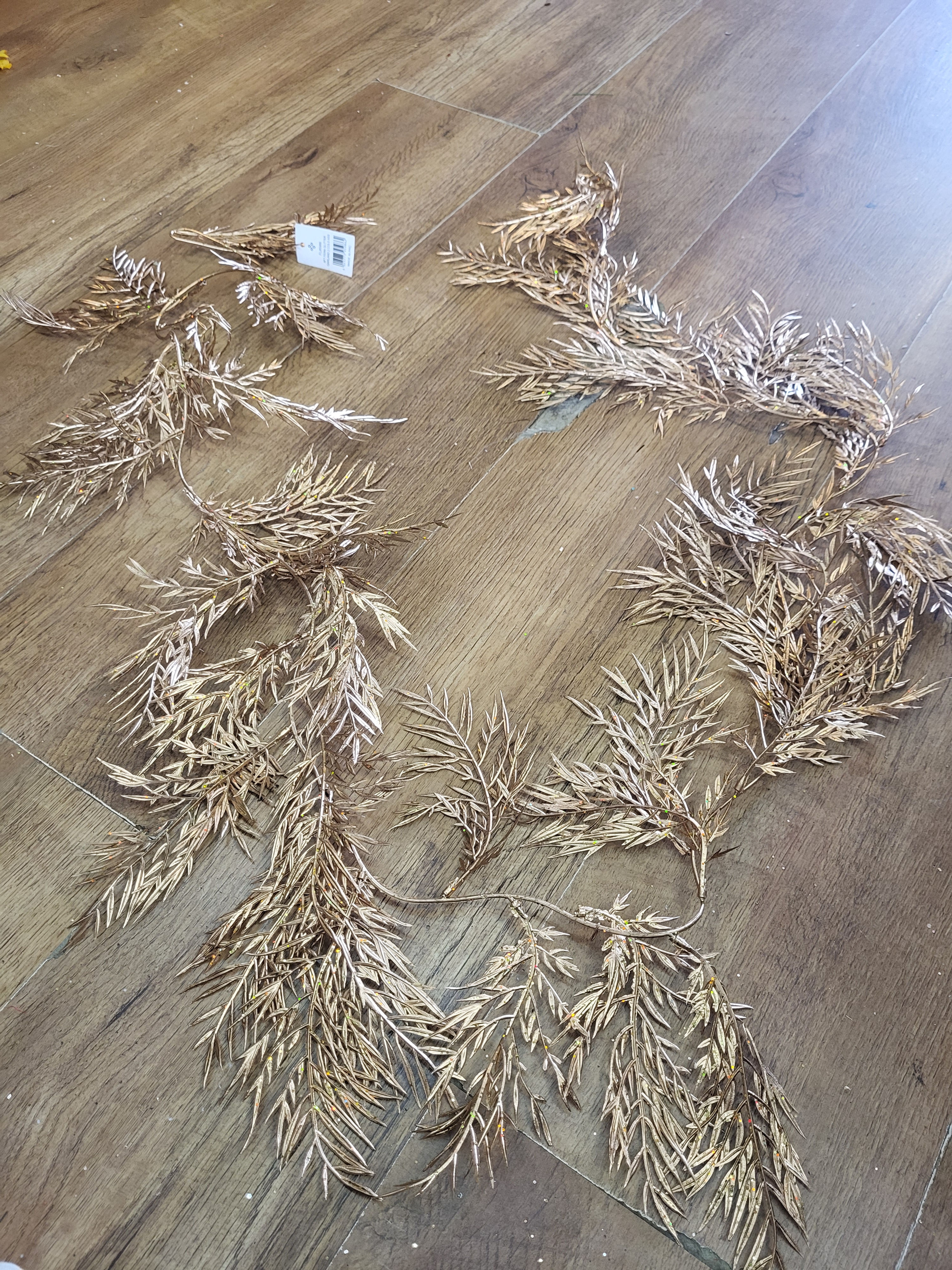 6ft slightly glittered metallic gold fern garland 