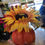 Thumbnail: Sunflower/berry/foliage in pumpkin display 