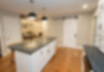 Kitchen island in newly restructured kitchen.