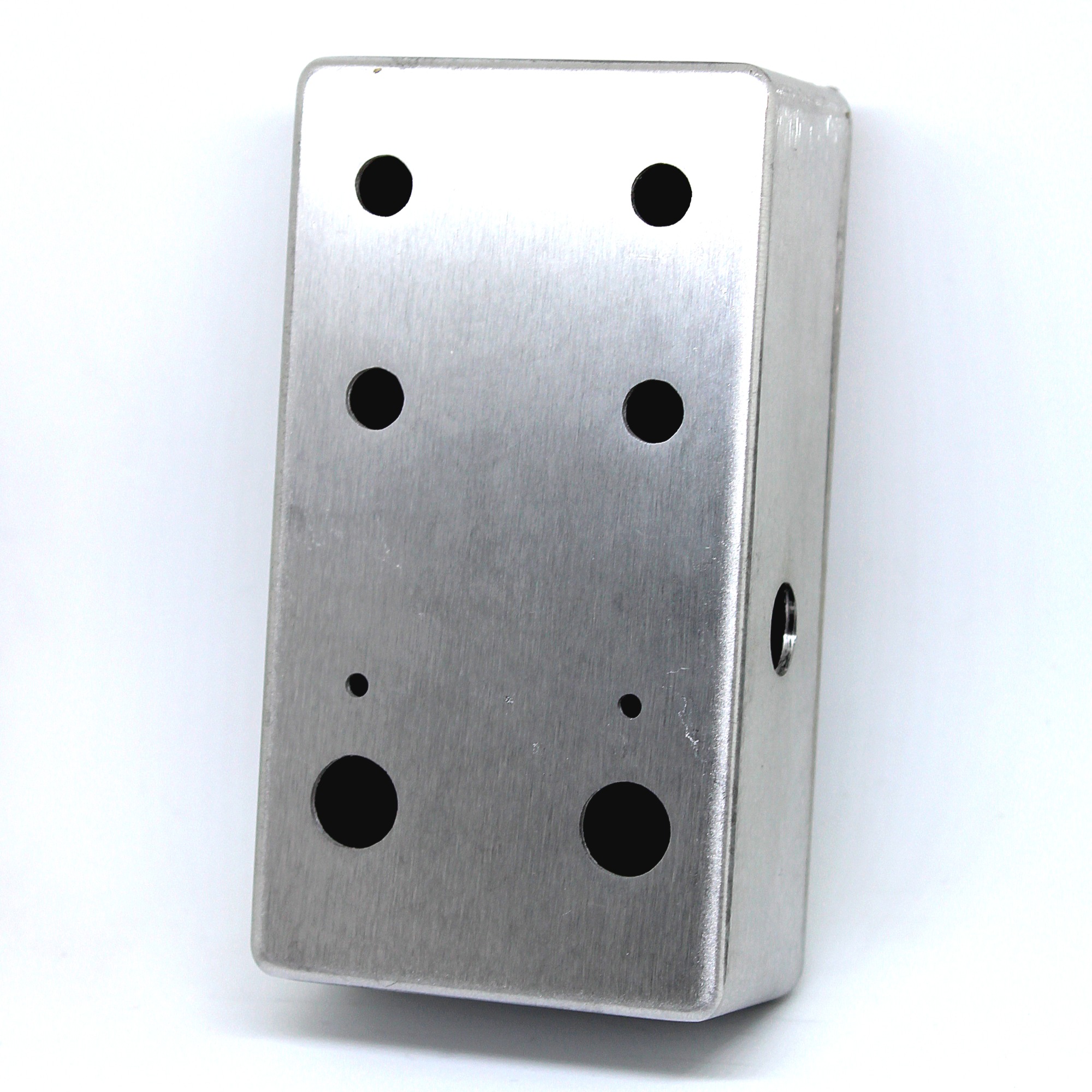 Plain brushed aluminum enclosure with drilled holes.