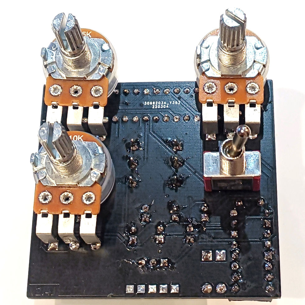 Thumbnail: front view of completed guitar pedal circuit board with knob posts