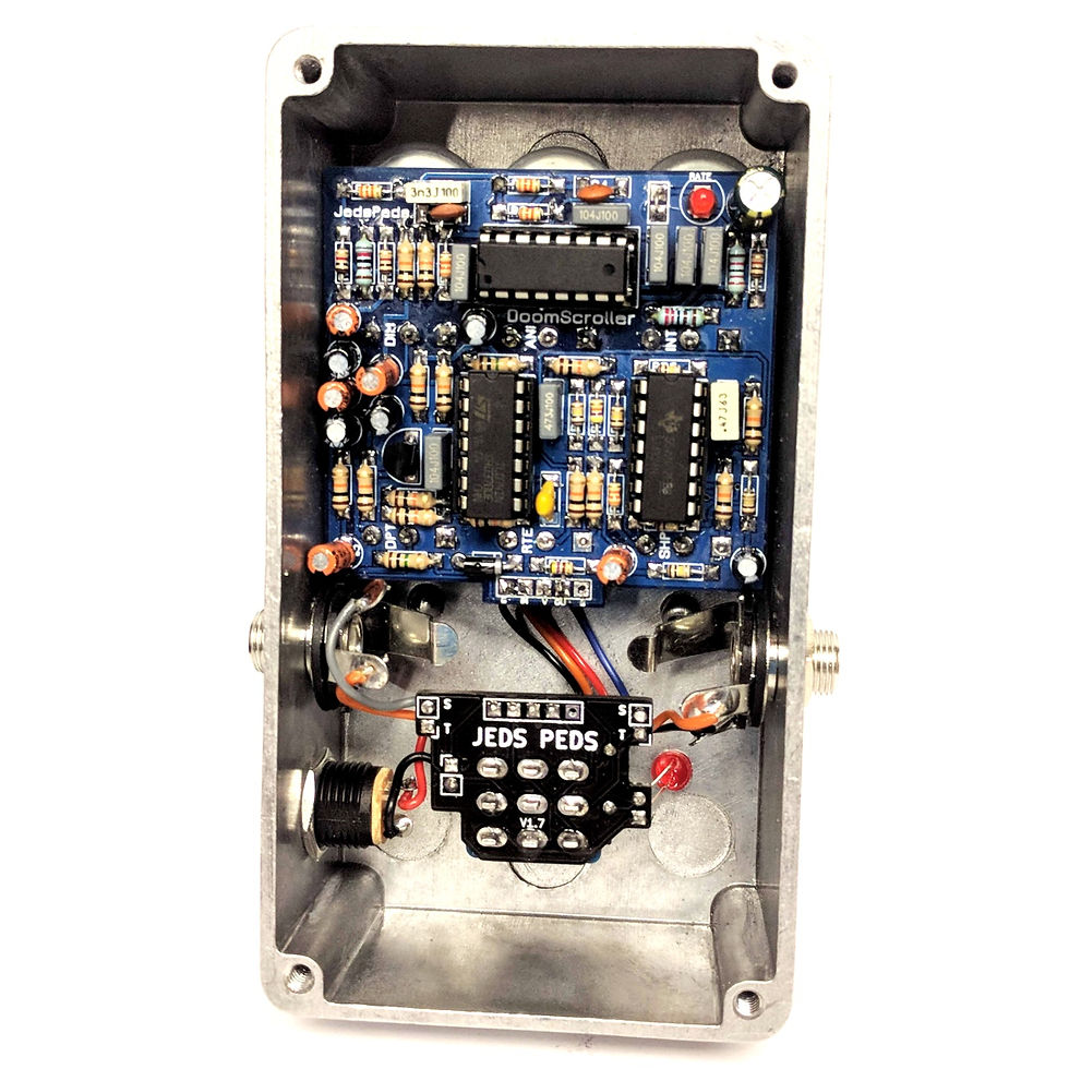 Thumbnail: front view of completed guitar pedal circuit board in a pedal enclosure