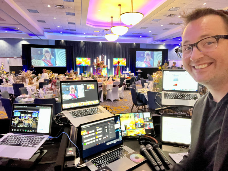 Zach Anderson Visual Entertainer mixing audio and visuals for a corporate event production