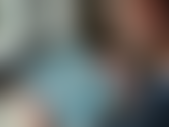 Eye-level view of a modern office desk with payroll documents and calculator