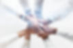 business-team-joining-hands-together-city-background.jpg