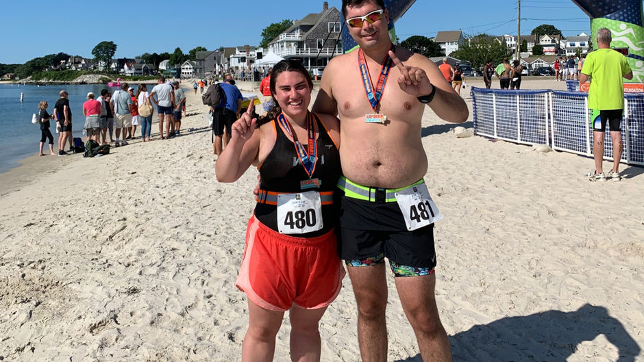 Katie and Alex at the finish line of their first Niantic Bay Triathlon (2019)