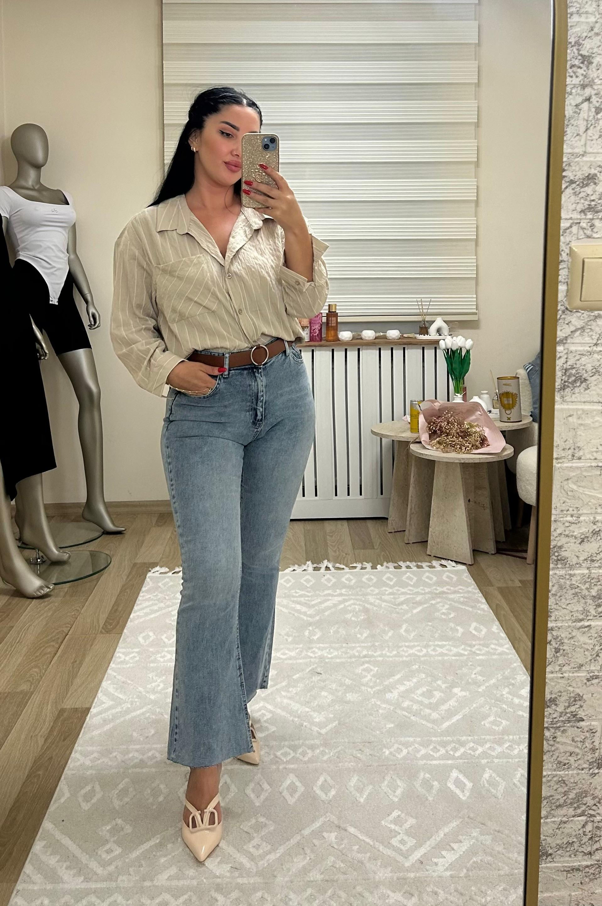 Kesik paça detaylı Kemerli kot pantolon