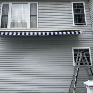 Retractable Awning Installation in Woodbridge CT Awning Boys Service LLC Awning And Screen Expert in Connecituct