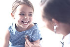 Smiling child with doctor_edited.jpg