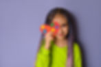girl-holds-heart-with-puzzle-pieces-is-symbol-autism.jpg