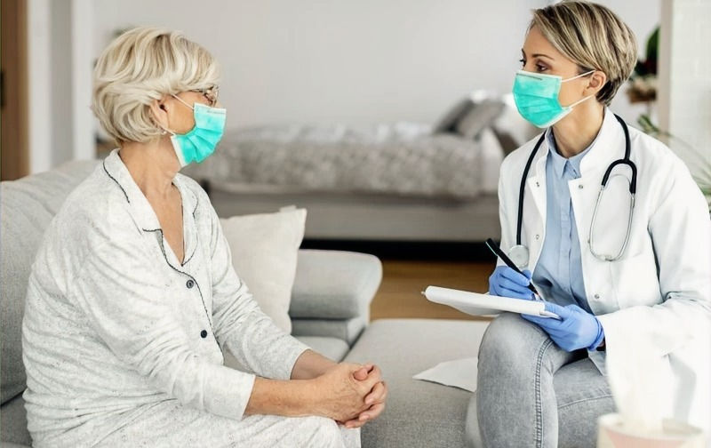 female-doctor-senior-woman-wearing-face-
