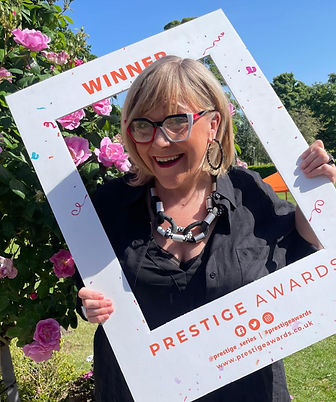 Josie Hadley from Audiology Marketing Professionals celebrating winning Specialist Marketing Agency at the Prestige Awards.