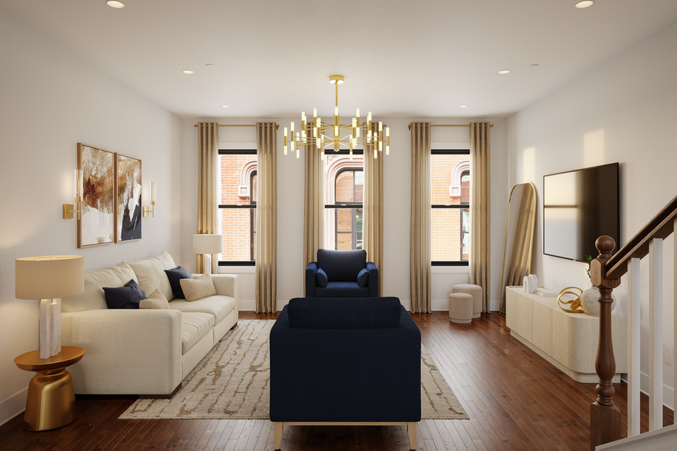 elegant living room with pops of navy and neutral hues