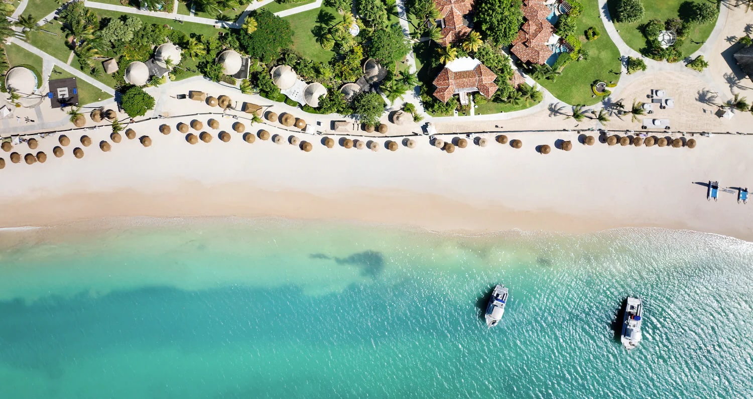 Calm white-sand beach at Sandals Grande Antigua
