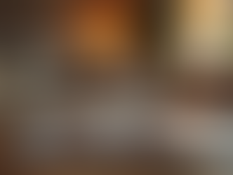 A book laying open on a coffee table