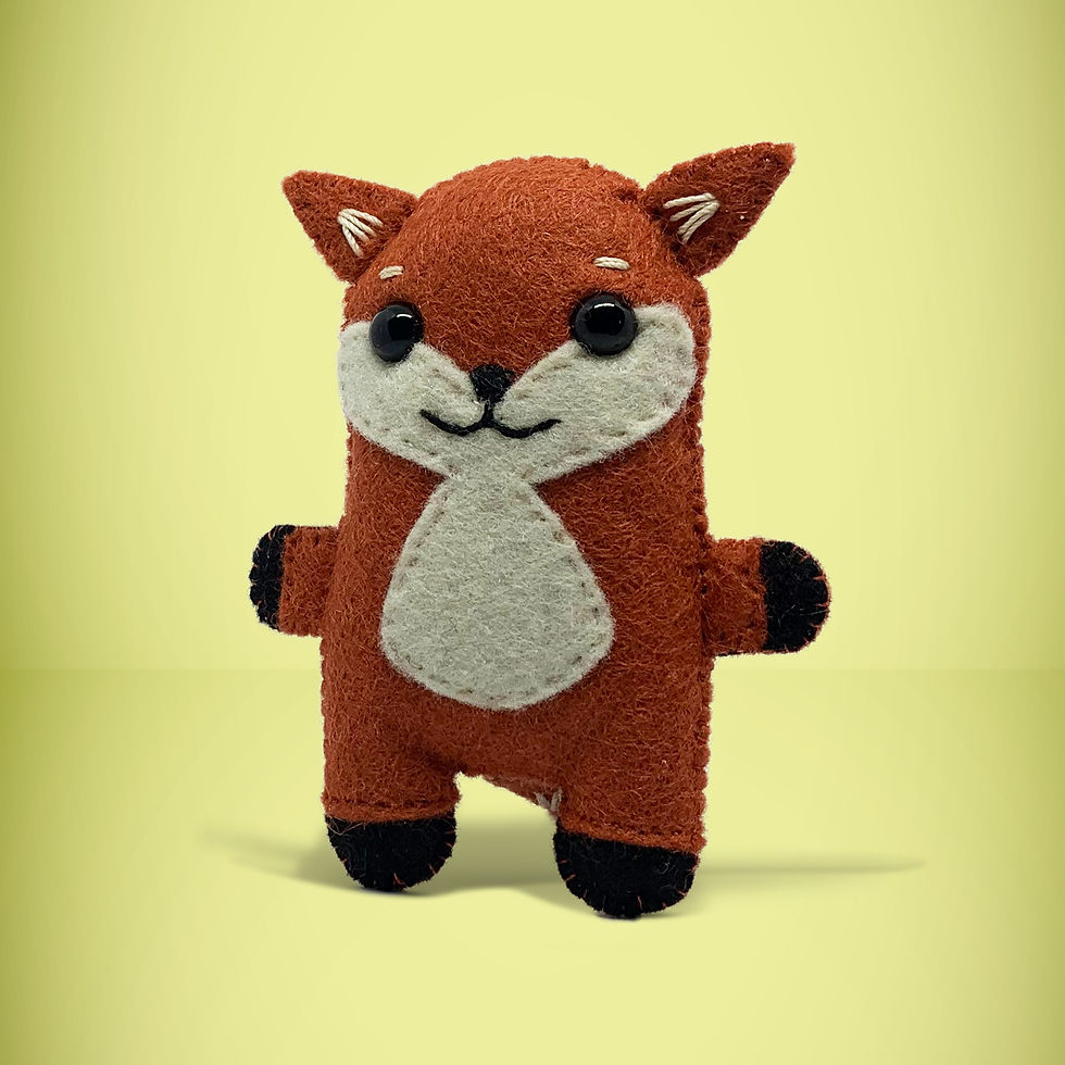 Thumbnail: Front view of mini fox. A perfect little gift for any fox lover. Super cute, handmade from left over felt.