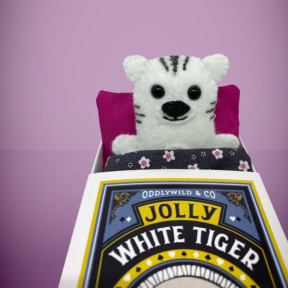 Handmade from felt this mini white tiger toy stands 110mm high and is perfect for your kids to that with them on their travel