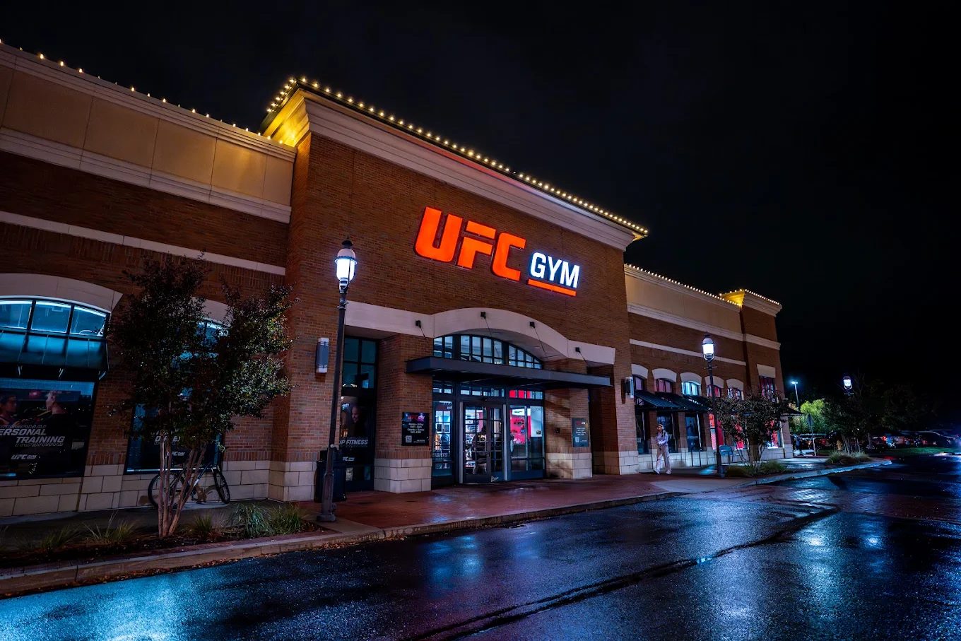 UFC Gym storefront at night